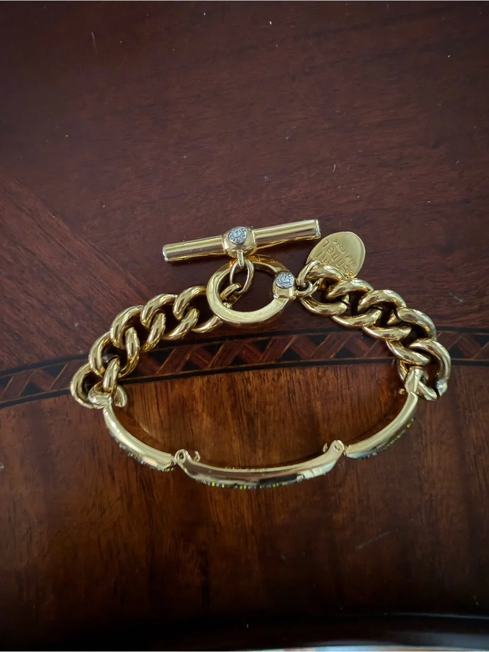 Henri Bendel Gold Tone Bracelet with Green Crystals Toggle Closure 7.5”